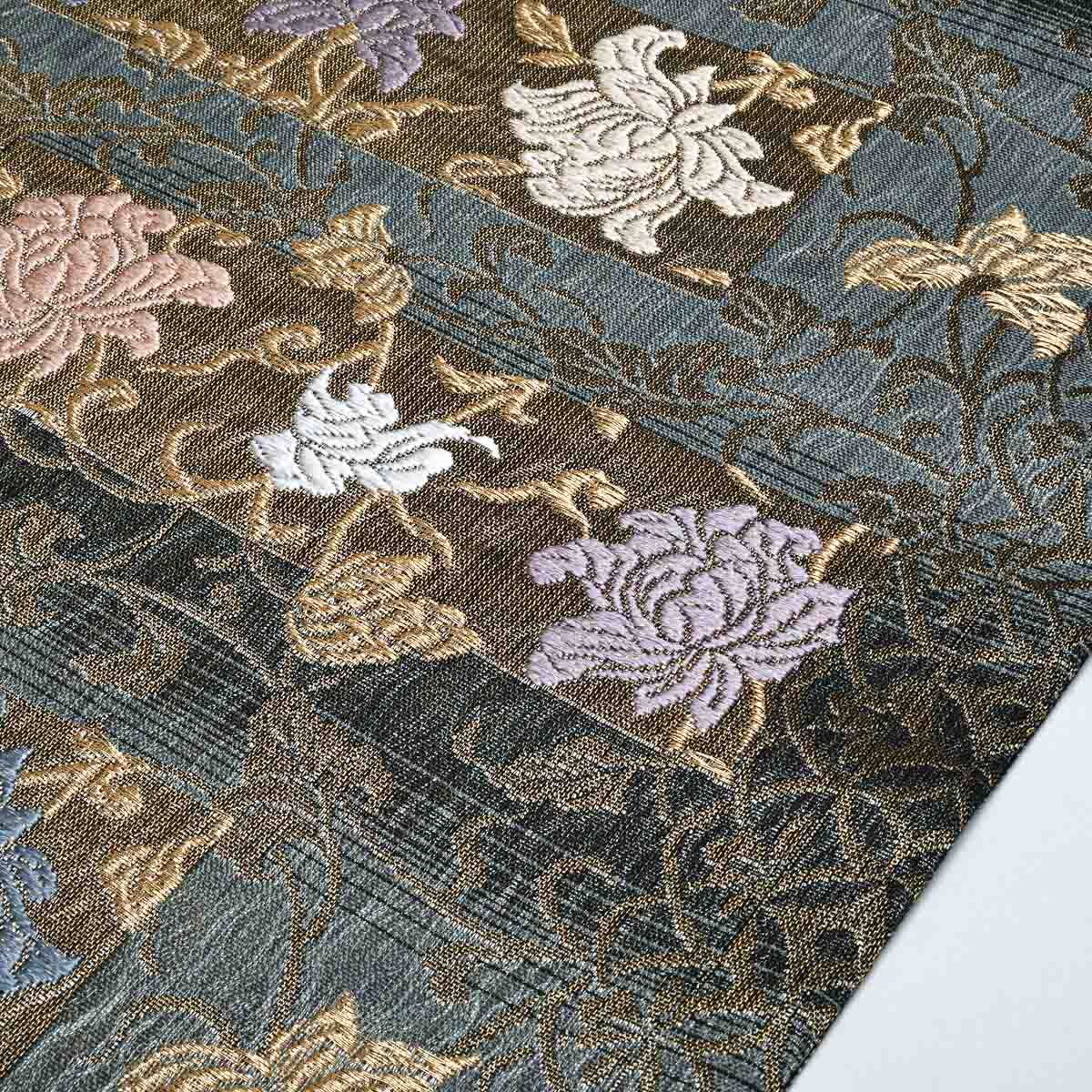 美品】名古屋帯 唐織 花唐草文 横段 ダークブルー 黒 金糸入り 西陣織